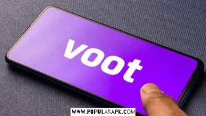 voot mod apk opened on a phone with a finger.
